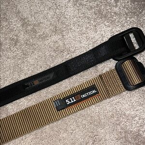 Two 5.11 tactical belts one black and one tan